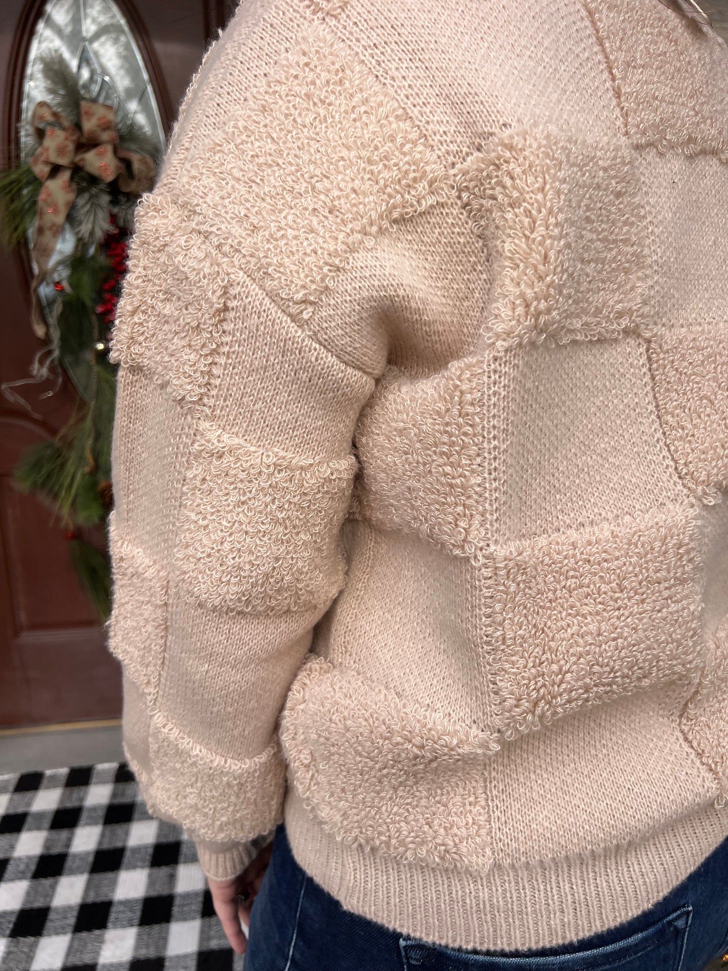 CHECKERED SHERPA ROUND NECK KNIT SWEATER