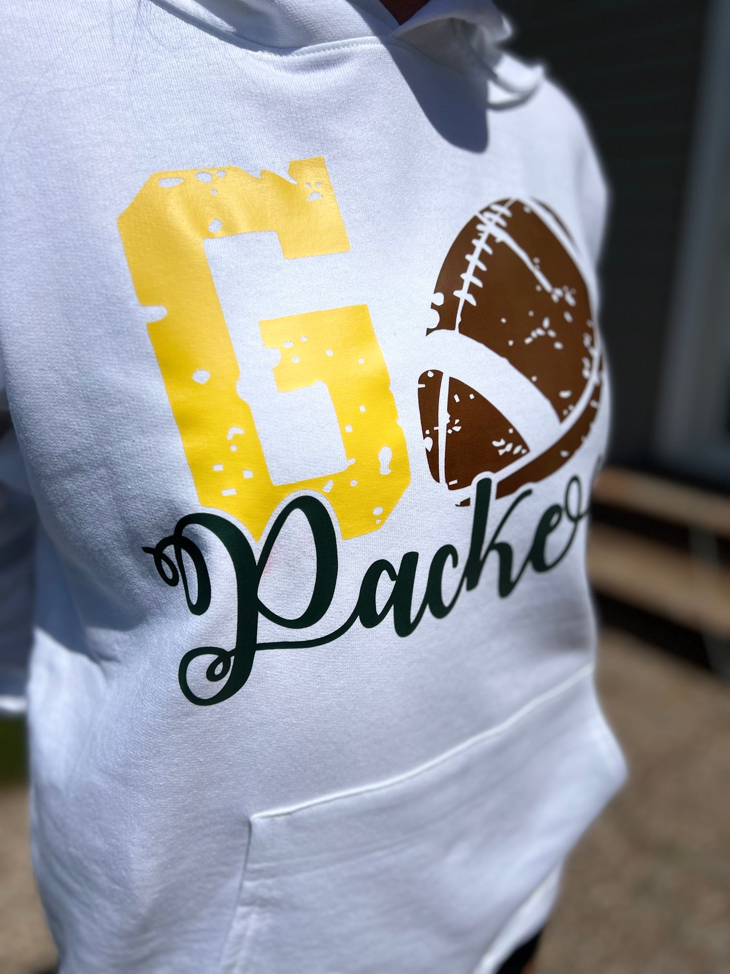 White hoodie with GO Packers logo